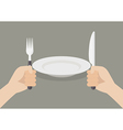 knife and fork cutlery in hands with white plate vector image vector image
