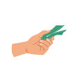 giving money hand holding dollar banknotes vector image
