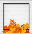 frame with autumn leaves on wooden background vector image vector image