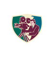 cameraman moviemaker vintage camera shield vector image