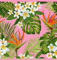 tropical flowers and palm leaves seamless pattern vector image vector image