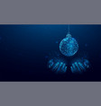 two hands are holding a christmas ball wireframe vector image