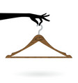 hand hold hanger vector image