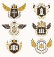 heraldic emblems with wings isolated on white vector image