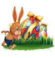 brown bunny and easter eggs vector image