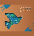 international day of peace in paper cut with dove vector image vector image