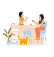 women friends chatting at breakfast at home young vector image