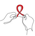 one line drawing of hand holding red ribbon vector image vector image