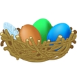 three colored eggs lie in a nest easter vector image