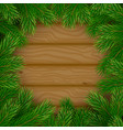 wooden background with fir branches vector image vector image