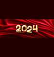 golden 2024 numbers on red silk cloth background vector image vector image