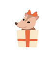 cute opossum with red bow on its head holding gift vector image vector image