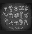 doodle sketch gift boxes on blackboard background vector image
