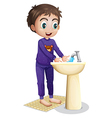 a boy washing his hands vector image vector image