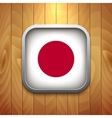 rounded square japan flag icon on wood texture vector image