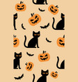 halloween seamless pattern with cats and pumpkins vector image vector image