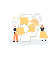 team of people putting puzzle pieces of huge head vector image