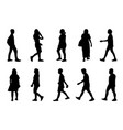 silhouette men and women walking on white vector image