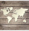 paper world map on a wooden board vector image vector image