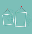two hanging photo frames blank background design vector image vector image