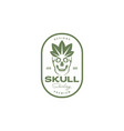scare skull smile with leaf badge logo design vector image vector image