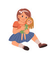 small girl kid playing with doll cuddling toy vector image