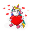 cute unicorn holding a red heart vector image