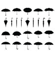 black silhouettes umbrellas vector image vector image